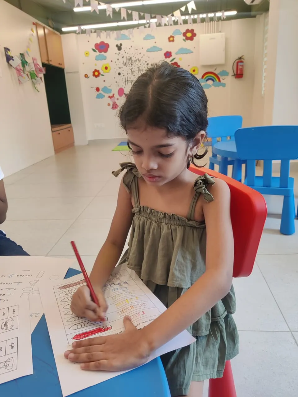 Discoverers programme — Miriam colouring at ULTRA_school Kochi