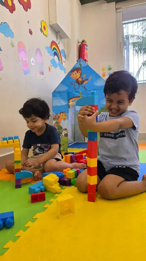 Children building with colourful blocks in the maker lab at ULTRA_school Kochi