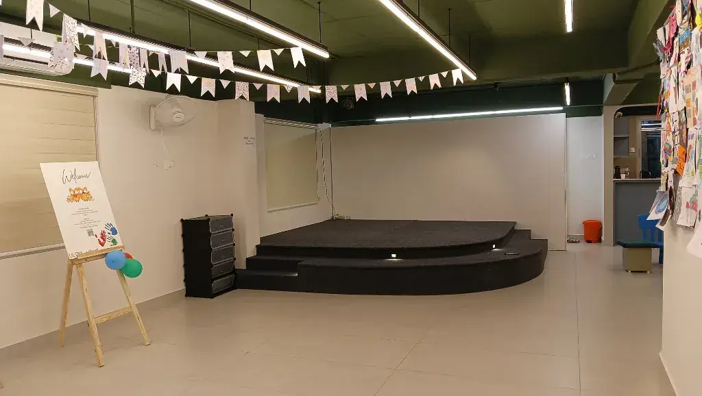 Tiered stage and welcome corner inside the ULTRA_school studio in Kochi