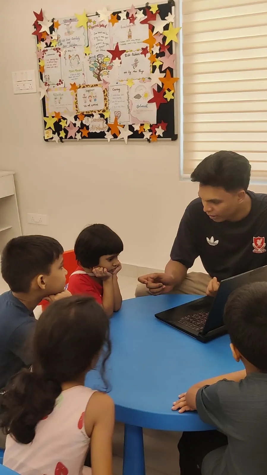 Children using laptops for tech-based learning at ULTRA_school Kochi